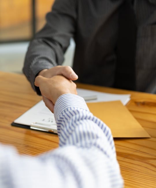 lawyer shake hands with client